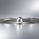 Pulsera de Cadenas con Medallón Plateado