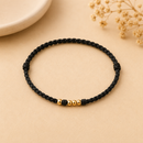 Pulsera de Hilo con Esferas Doradas