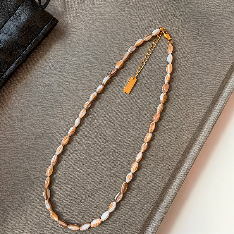 Collar Perlas Ovaladas en Tonos Tierra