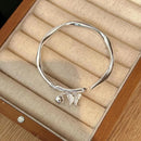 Pulsera Alas Plata