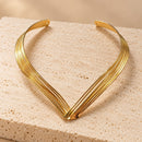 Conjunto de Gargantilla y pulsera dorada multicapa